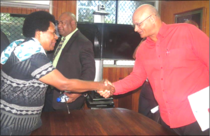 Director Project Allocations Mrs. Magdalene Maihua meeting Minister Schnaubelt. 